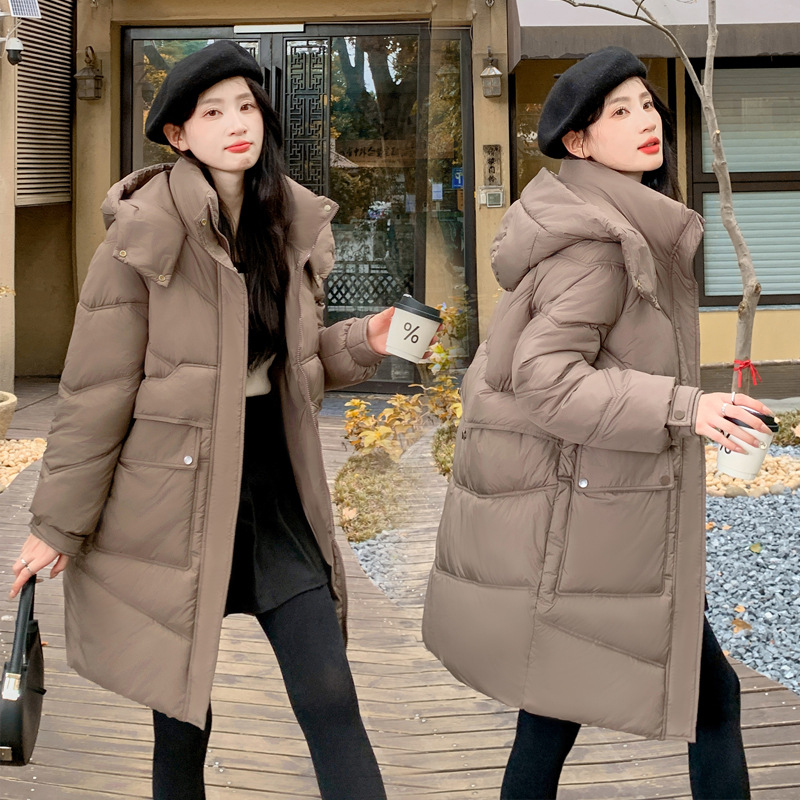 Ropa de algodón femenina larga sensación de diseño nicho abrigo de algodón caliente chaqueta de algodón holgada coreana 2024 nuevo abrigo de otoño y invierno