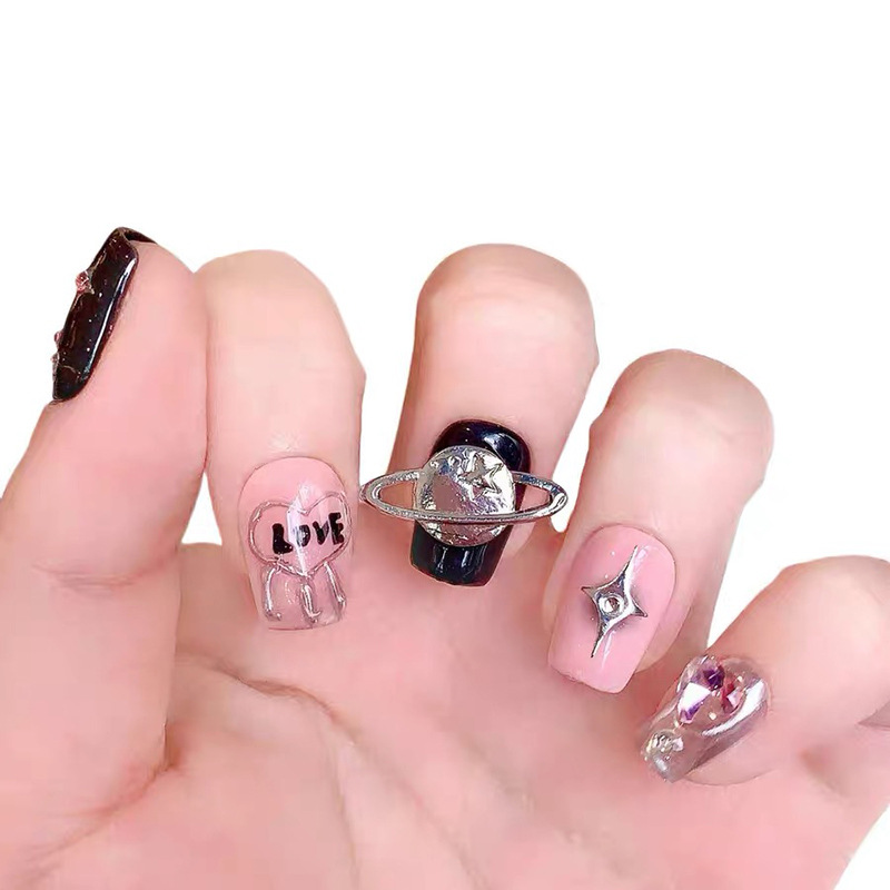 Yi danza fototerapia hecha a mano desgaste pieza de uñas corto vagando planeta desgaste pieza de uñas al por mayor fuente fábrica clavo pieza