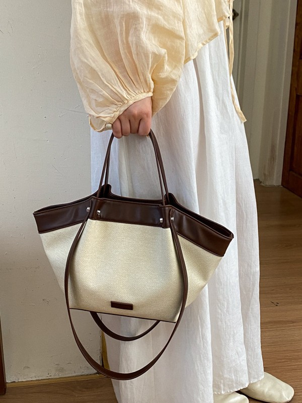 Bolso de mano de gran capacidad para mujeres 2026 nuevo nicho de color de colisión de la bolsa de viaje tote casual simple bolso de hombro axilar