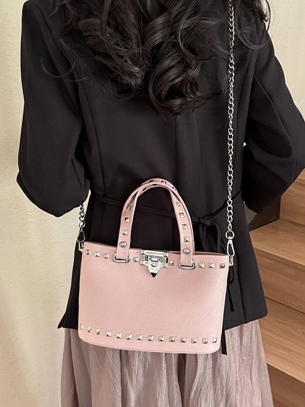 Bolso para mujeres 2026 nueva moda transfronteriza bolso de mano de moda alta sensación lichi remaches mochila de hombro