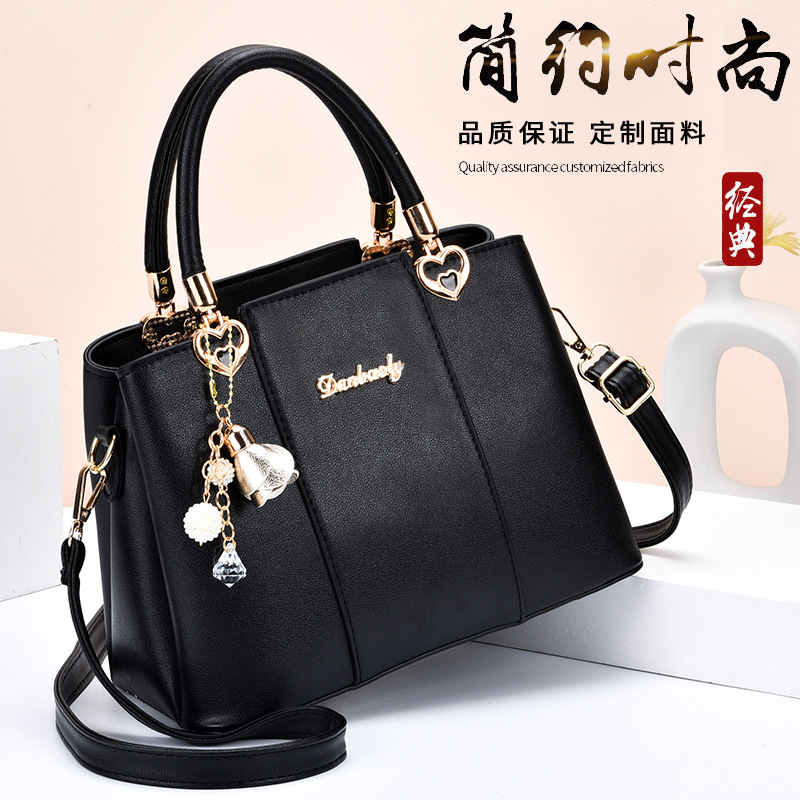 Bolso grande de las mujeres del fabricante nuevo bolso ocasional simple bolso de las mujeres de mediana edad bolso de la madre bolsa de mensajero del hombro del todo fósforo