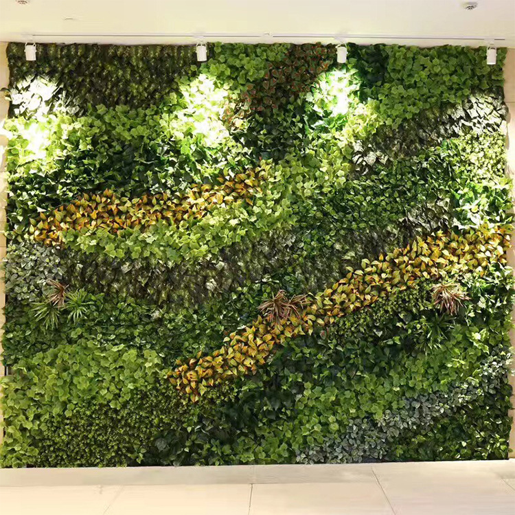 Accesorios de planta de simulación de fábrica falsa planta verde decoración de pared planta de plástico césped falso mango de flores manojo de hojas al por mayor