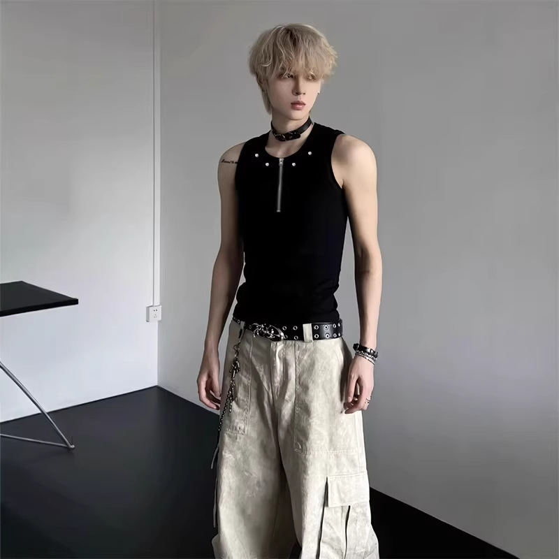 Black half-zip studded vest, male model's summer OOTD outfit, shoulder-length t-shirt, trendy.