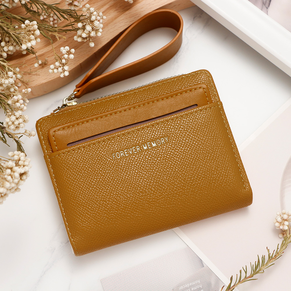 Nueva billetera corta de mujer fresca y simple doble cremallera bolso de cambio multi-tarjeta bolso multifuncional