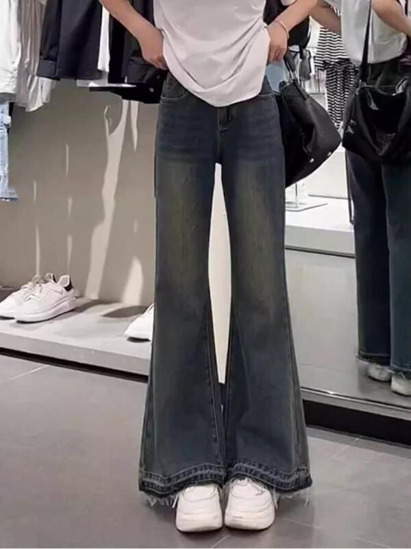 Women's flared jeans, petite size, with a stylish design featuring frayed edges and a slimming effect, versatile and trendy floor-length flared pants