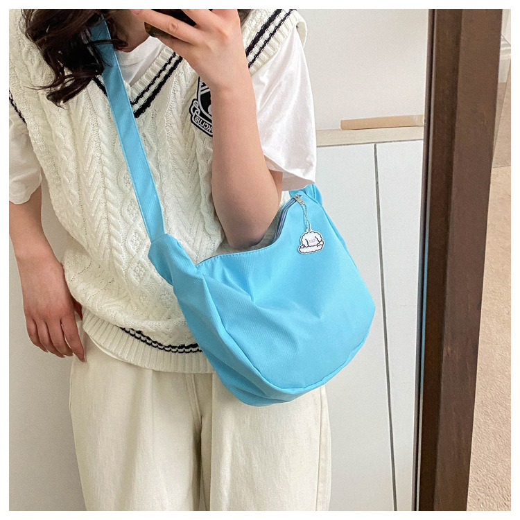 Large capacity canvas shoulder for women in spring summer 2023, new solid color, simple and fashionable casual bag,_voghion.com
