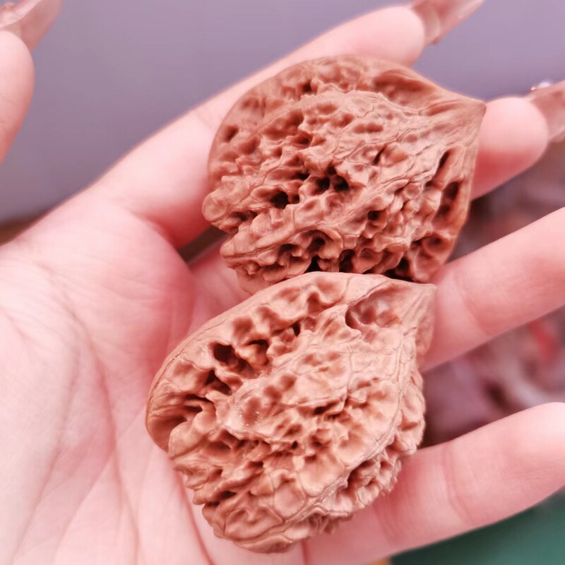 文玩くるみの屋台、文玩くるみの手元飾り、マッチングするキリン模様の練習用くるみ|undefined