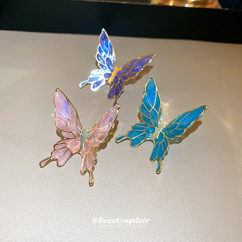 Pinzas para las orejas de aceite de goteo de mariposa súper hada sin orejas pinzas para las orejas de temperamento dulce y de moda, pendientes de personalidad fresca y de todo fósforo al por mayor