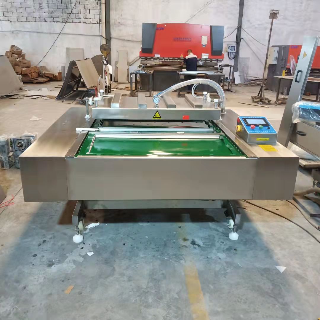 商用腊肉香肠滚动真空包装机 烧鸡真空包装机 诸城滚动包装机厂家