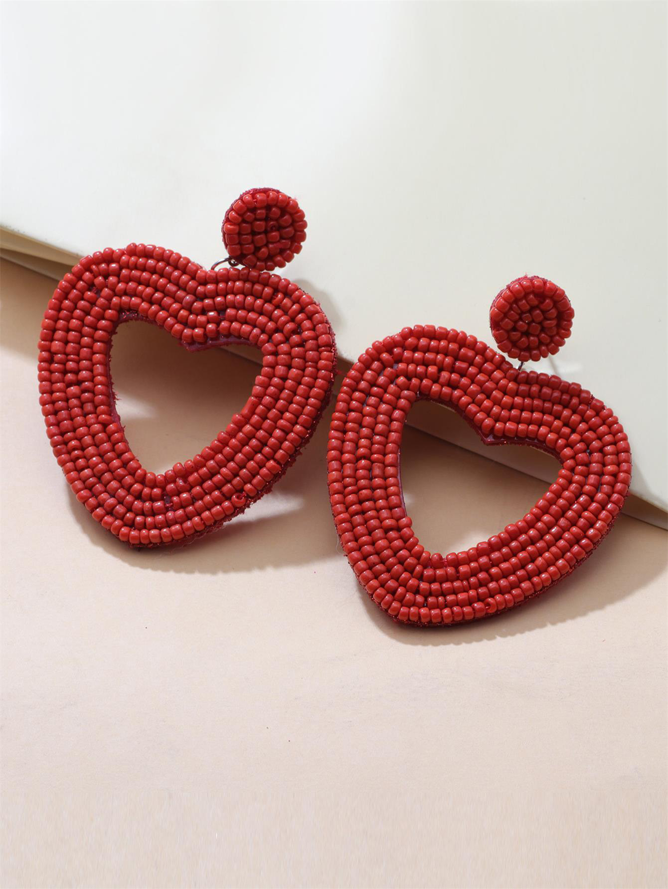 Holiday Color Ethnic Red Bead Hollow Heart-shaped Earrings display picture 4