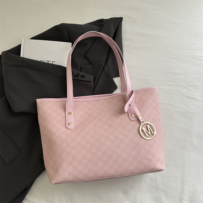 Bolsos de gran capacidad para mujer 2025 nueva primavera y verano todo-fósforo diseño de nicho clase bolso de viaje de un solo hombro bolso portátil