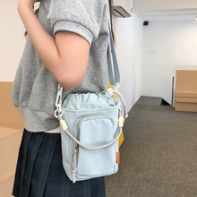 日系ins双肩包休闲斜挎包旅行水壶包学生轻便水杯包运动小包包女