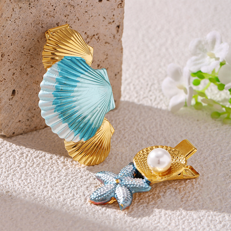 TENA Europa y los Estados Unidos nuevo estilo de vacaciones en el mar de color conchas broches de cabello de alta calidad exquisita lujosa marina al por mayor