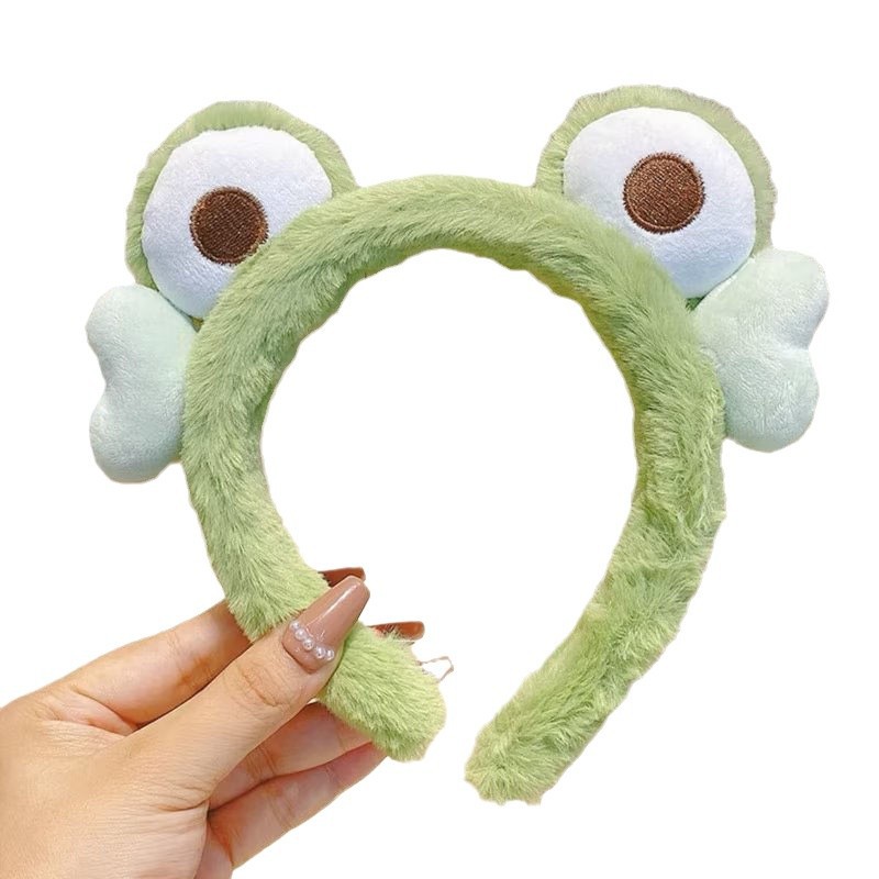 Otoño y invierno lindos bandas de cabello de ranas para mujeres máscaras faciales para lavar la cara dibujos animados de peluche bandejas de cabello extrañas tarjetas de cabello al por mayor