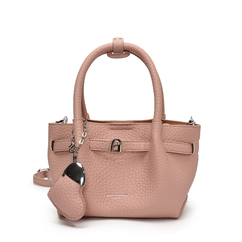 Tendencia versátil bolso de mano para mujeres 2025 nuevo estilo simple textura de transporte de tren mochila de alta calidad bolso de brazo de moda