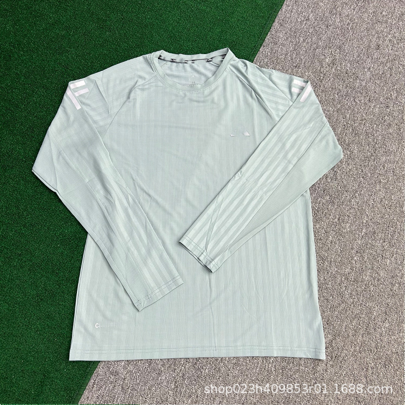 Comercio exterior nuevo deporte correr entrenamiento de acondicionamiento físico hielo elástico rápido secado atletismo hombre camiseta deportiva de manga larga camiseta