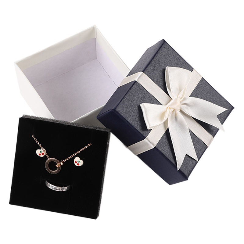 Fábrica en stock de seis colores arco joyería caja tapa joyería caja de embalaje collar pendientes joyería caja de regalo al por mayor