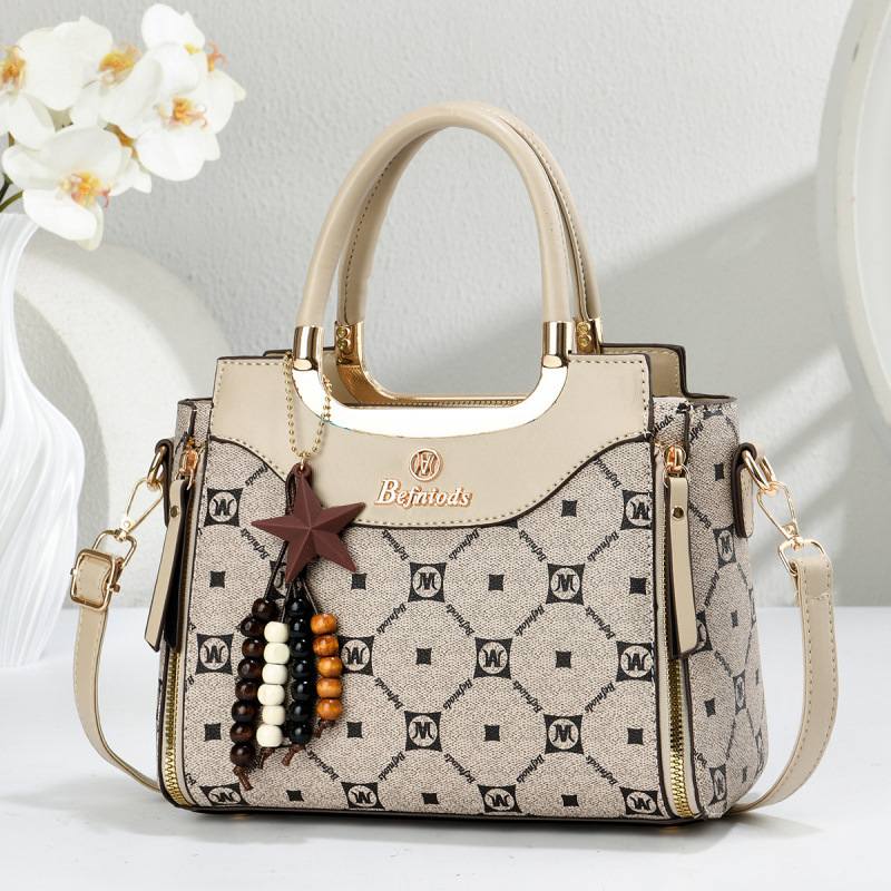 Bolsas de mano de moda casuales con estrellas colgantes, bolsas de hombro, bolsas de transporte aéreo, bolsas de mujer transfronterizas