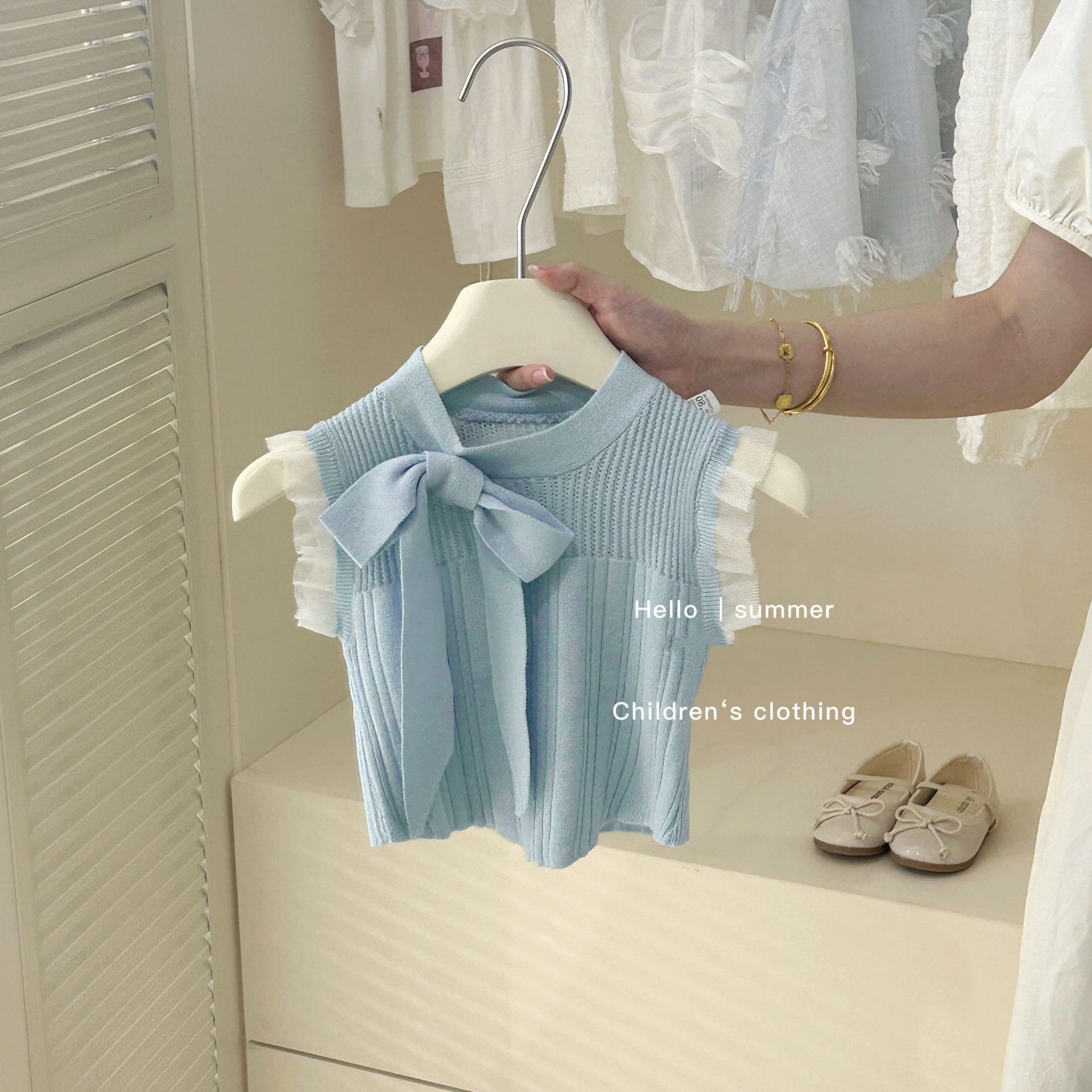 スイートベイビー2025新作おしゃれ子供用リボン付きニットベストトップスと花柄スカートのツーピースセット