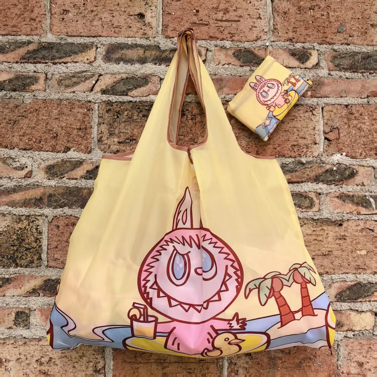 大型アニメスポット折り畳み環境保護レジ袋携帯袋が軽くて、野菜バッグを買って収納するファッションを繰り返している