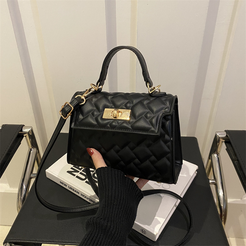 Bolso de mano con cerradura de cercanías para mujer 2024 otoño e invierno nuevo estilo salvaje ins diseño de nicho bolso salvaje ins Kelly