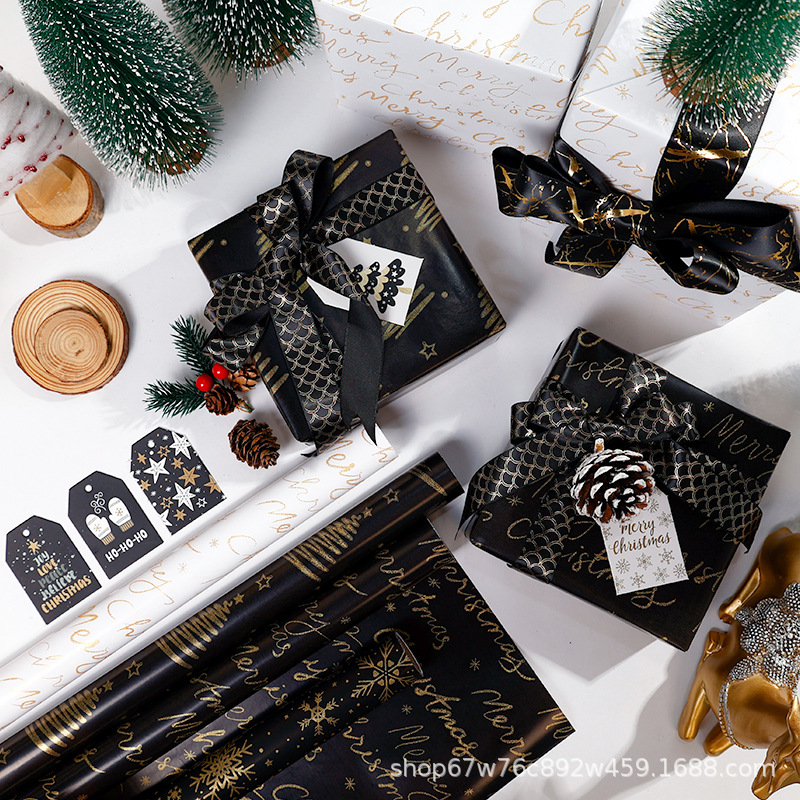 Rollo de papel de regalo de Navidad transfronterizo paquete de tubo de papel de regalo de árbol de Navidad de copo de nieve de oro negro rollo de gran tamaño sentido avanzado