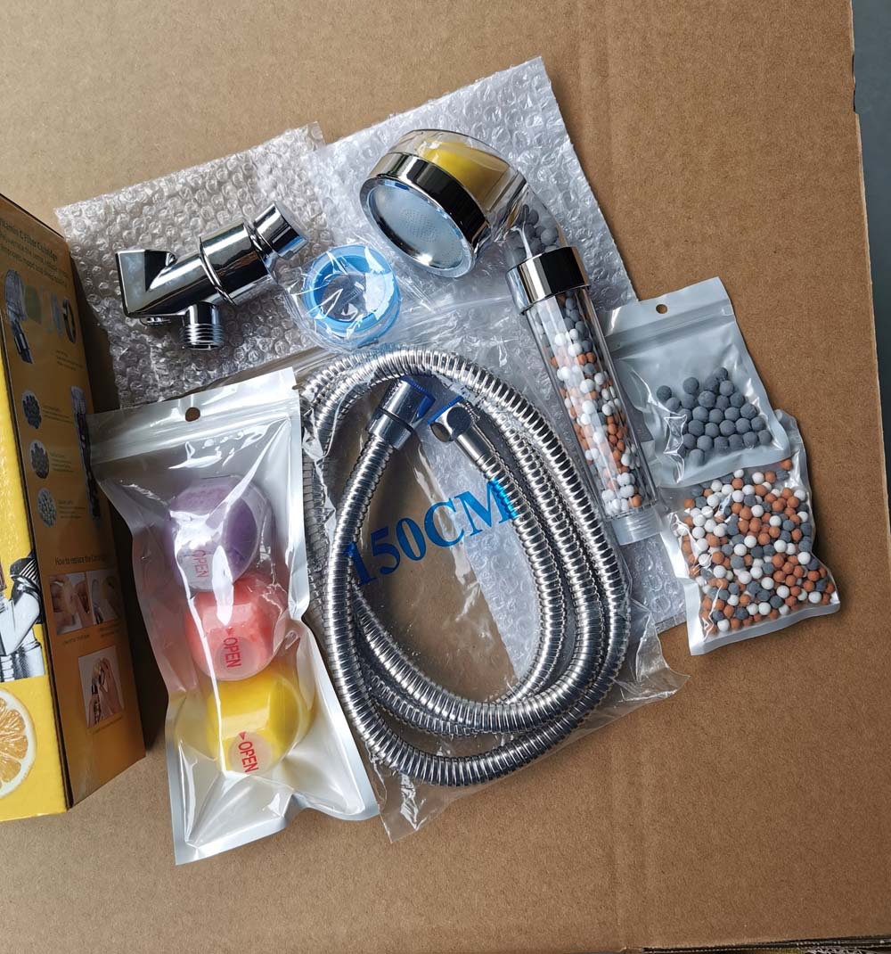 The lemon VC fragrance negative ion shower head cover is equipped with an American-style shower boom adapter and a shower hose fragrance delivery block Application Scenario