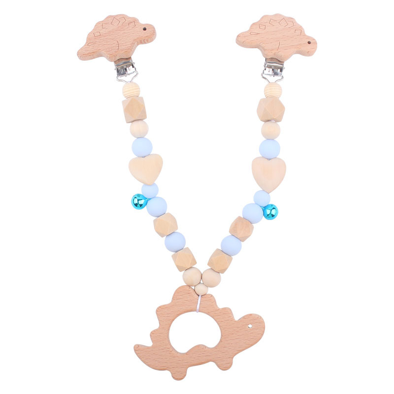 Suministros para bebés pulsera de silicona molar de juguete para niños Cadena de cochecito de dinosaurio de tres piezas creativa pequeña campana colgante