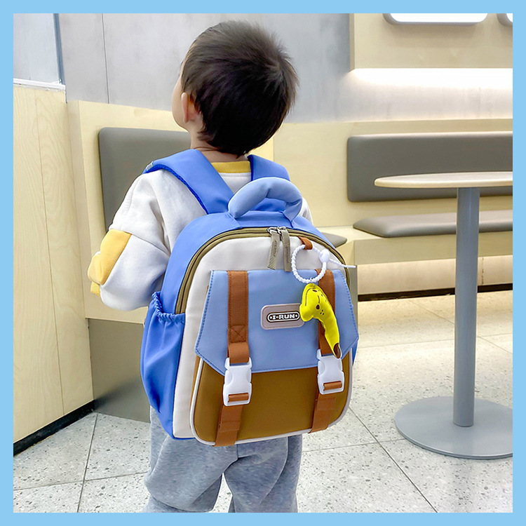 Nueva mochila escolar de jardín de infantes, reducción de la carga ligera, color de contraste, mochila de tendencia, mochila escolar pequeña para niños, mochila de viaje