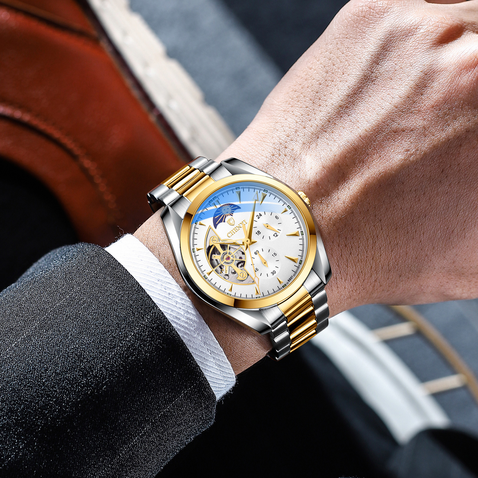 Chenxi reloj mecánico de los hombres impermeable Sun Moon Star automático cinturón de acero hueco reloj multifuncional 8801