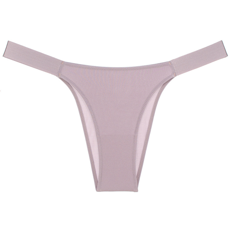 外国貿易の大きいブランドの新商品の女性の下着の純色のシルクの光の三角のズボンの低い腰のt字のズボンの版は尻の欧米のF008を包みます|undefined