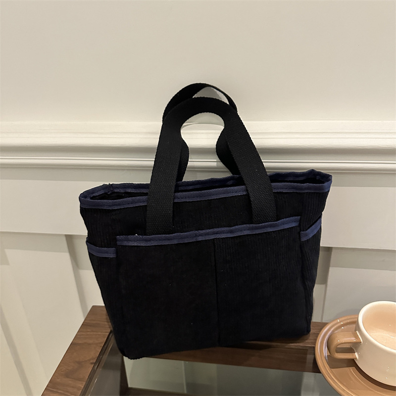 Bolsa de lona para mujeres 2024 nuevo invierno bolso de viaje de clase simple de gran capacidad bolsa de mano bolsa de hombro ocio