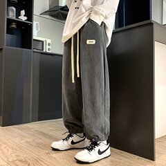 秋のカジュアルパンツ男性のレトロなファッションがゆったりしています。