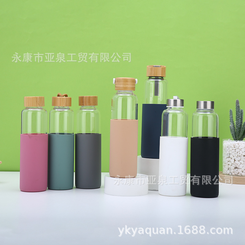 Fabricante suministro de copas de vidrio de alta borosilicina de bambú cubierta de vidrio de automóvil doméstico taza de bebida directa con cubierta de silicona taza de regalo al por mayor