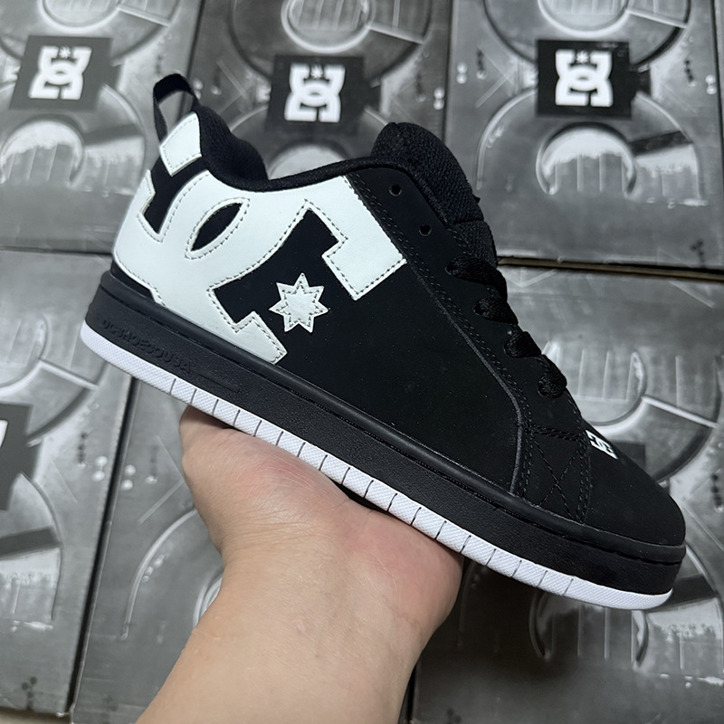 Comercio exterior transfronterizo al por mayor DC zapatos casuales zapatos de skate hombres y mujeres zapatos deportivos de estilo europeo y americano zapatos de estilo de estilo de vaca ancho zapatos de moda