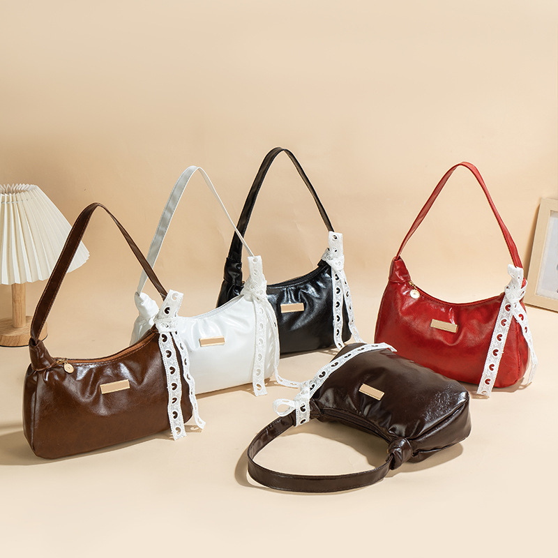 Bolso de cuero PU suave de cuero de aceite 2025 nueva moda universal bolso de moda de mujer bolso de brazo portátil pequeño