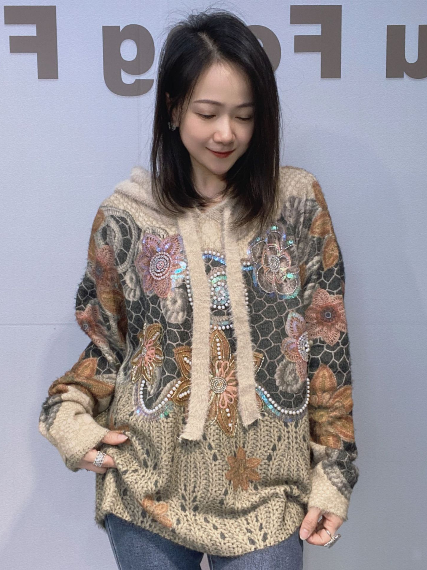 Capacious winter waterproof knitted sweater