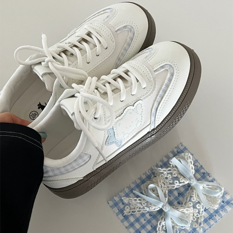 Zapatos de skate de arco para mujeres otoño de 2025 nuevos zapatos blancos transpirables de nicho para mujeres coreanas zapatos de entrenamiento moral para mujeres