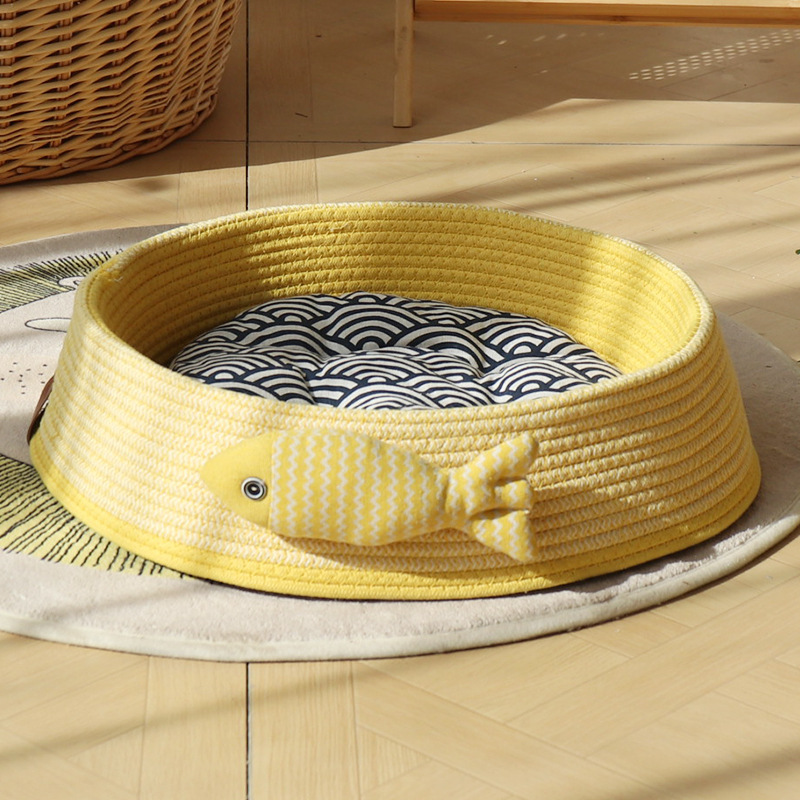 접힌 골판지 노란색 + 작은 물고기 + 파란색 면 패드