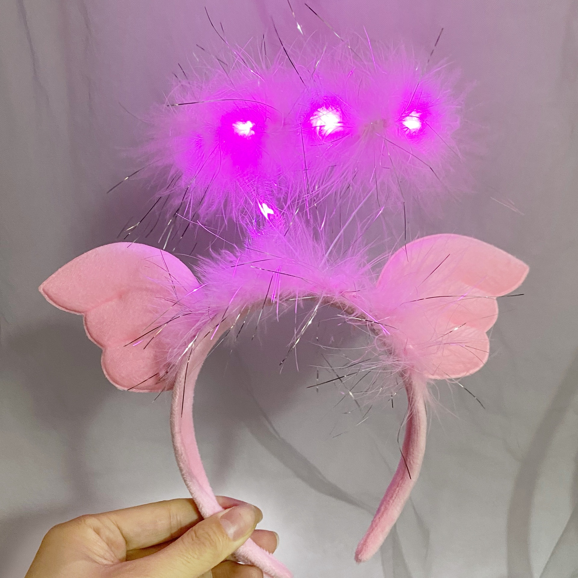 Nueva diadema con orejas de conejo de plumas con luces intermitentes, accesorio para la cabeza súper brillante, horquilla luminosa, popular en atracciones turísticas y puestos callejeros, venta al por mayor.