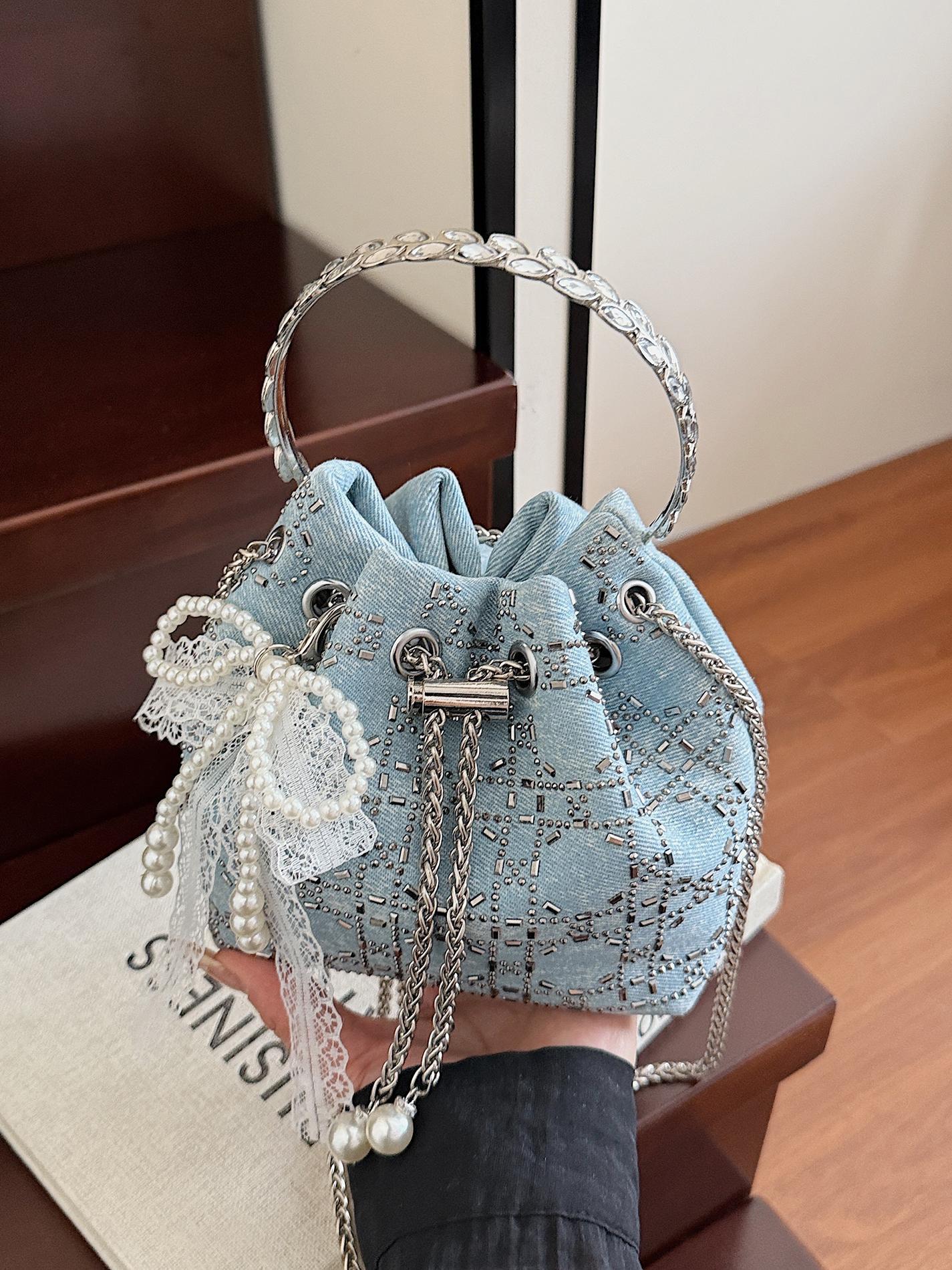 Verano popular taladro caliente bolso de cubo de mano mujer 2025 nuevo estilo coreano denim casual mochila para trabajar