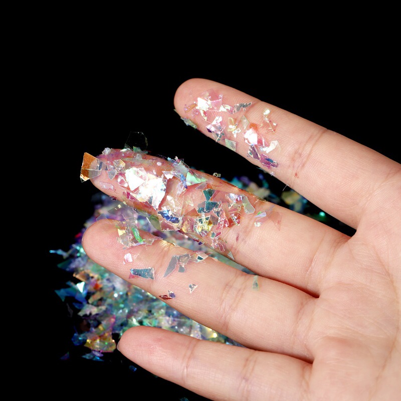 Nail art cellophane fragments magic color nail art irregular candy paper phototherapy nail nail stickers sequins a pack of 20g Nail art cellophane fragments magic color nail art irregular candy paper phototherapy nail nail stickers sequins a pack of 20g
