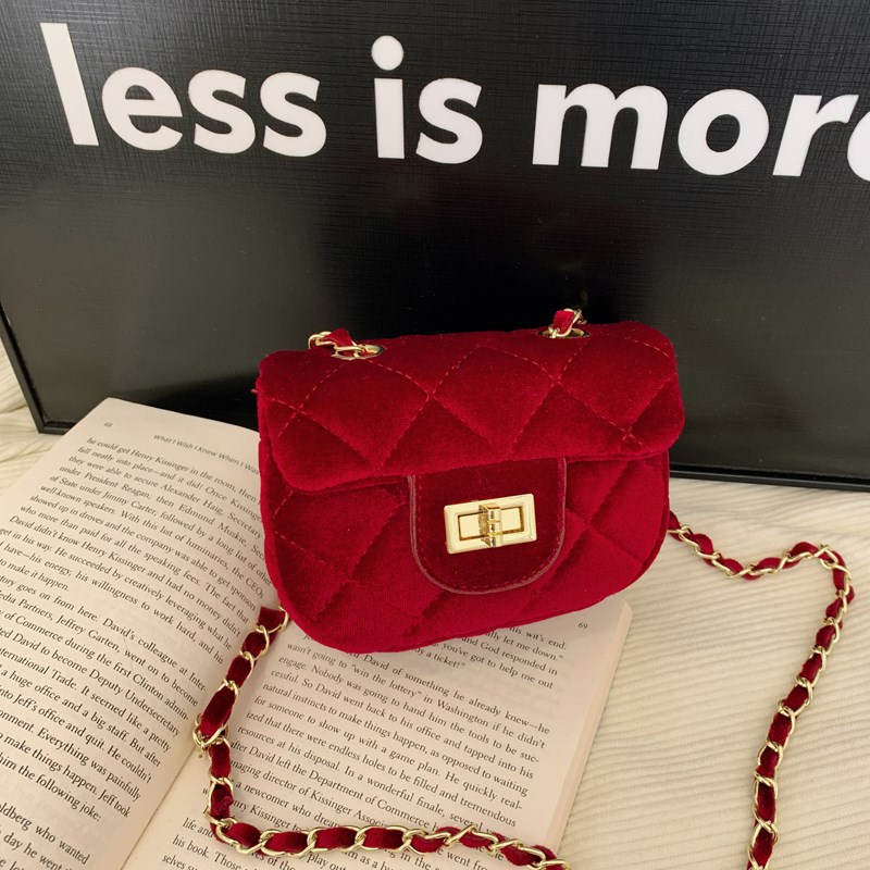 Bolsa de hombro coreana de niñas de terciopelo fragancia de color sólido mini mochila de bebé 2025 nuevo bolso de cadena para niños