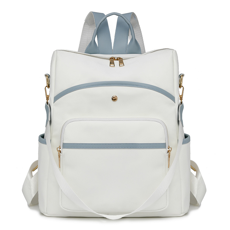 Mochila para mujer Mochila multiusos simple de gran capacidad Color sólido Moda ligera Bolsa de cuero de viaje al por mayor