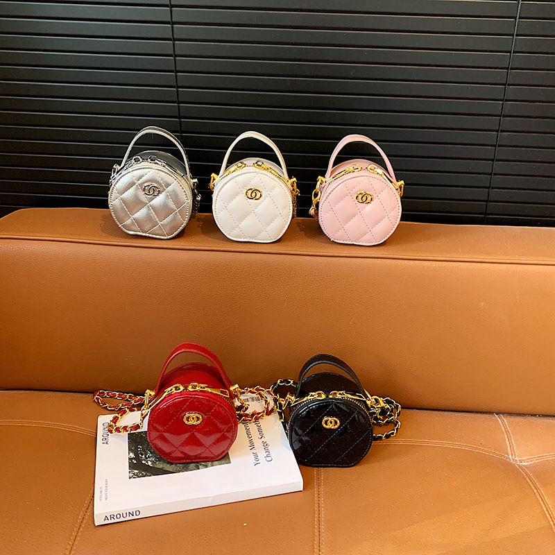 Bolsa de hombro para bebés de color sólido de moda diamante exquisita mini bolsas redondas para niños y niñas 2026 nuevos accesorios para niños