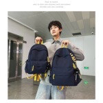 大学生书包男女初中高中小学生背包2025新款休闲旅行轻便小双肩包