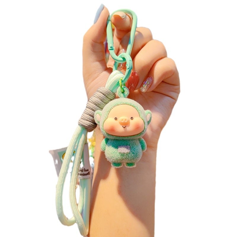 Antena de flojo de dibujos animados pareja llavero de coche creativo colgante de llave de bolsos de mujer colgante colgante al por mayor