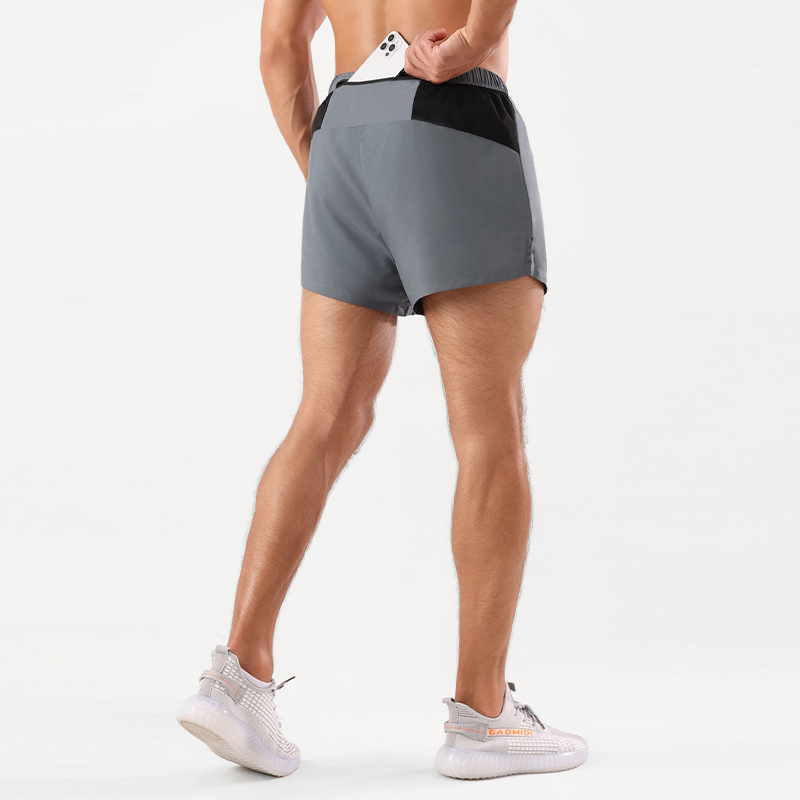 Pantalones cortos deportivos de tres puntos para hombres de verano de secado rápido que absorbe la humedad maratón profesional corriendo pantalones de entrenamiento físico de doble capa anti-exposición