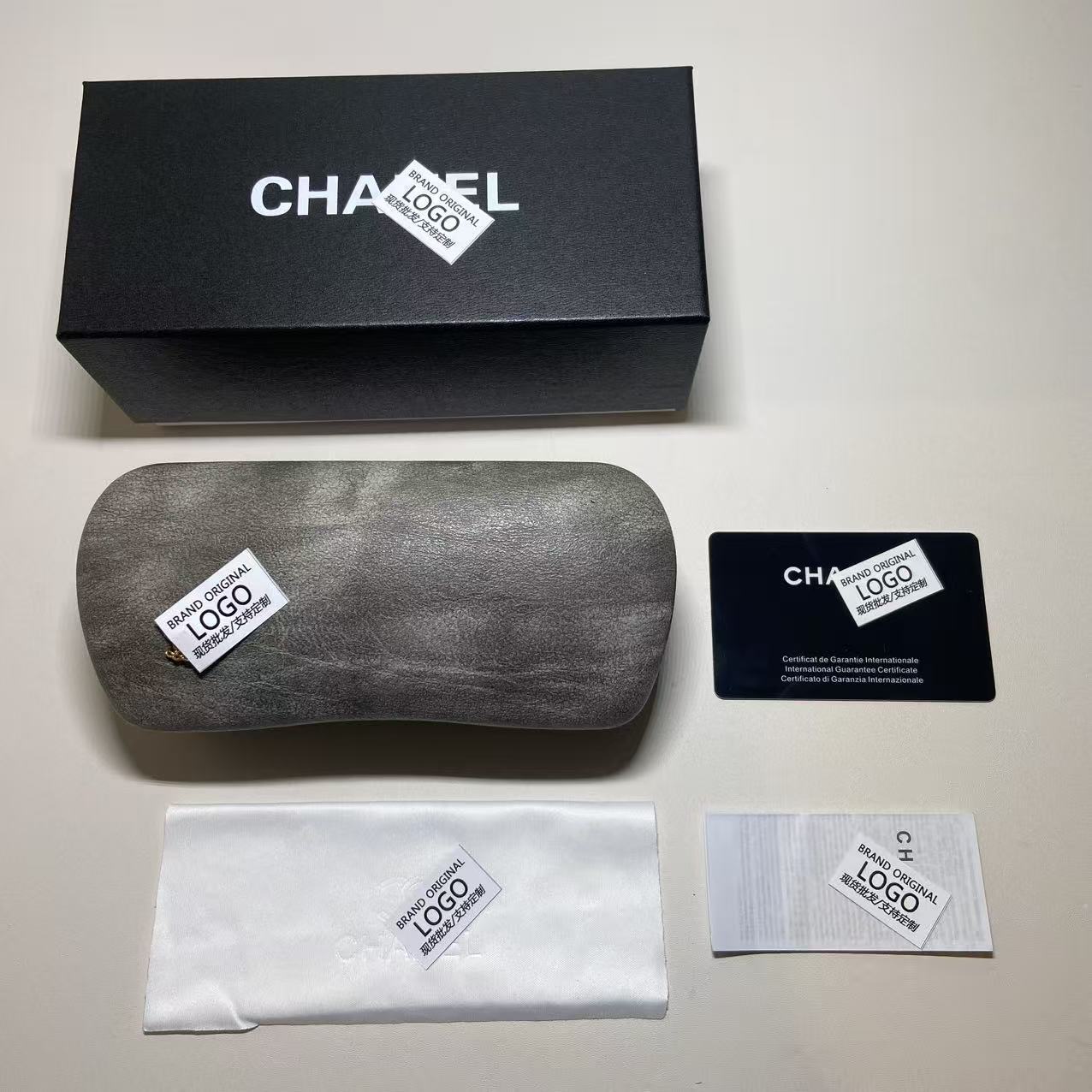 Mayorista de marca de alta calidad Xiaoxiang caja de gafas de sol conjunto completo de moda caja de embalaje de gafas de sol alta calidad