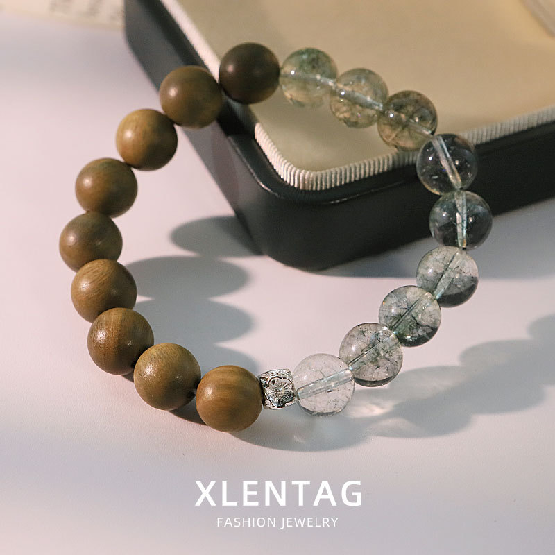 Diseño original de madera de sándalo grieta de cristal cuentas pulsera temperamento retro pulsera de moda versátil alta sensación joyas de la mano